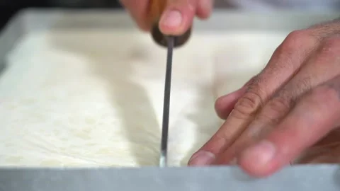 A chef making Turkish baklava Stock Footage 150082863