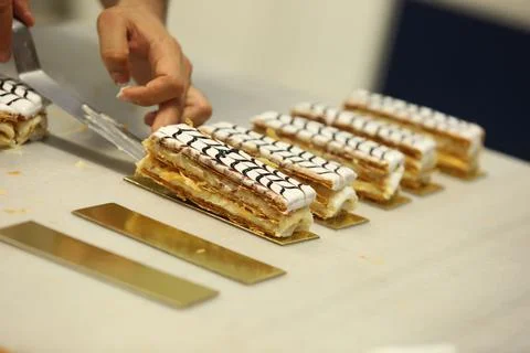 Chef making 'Vanilla cake' Stock Photos