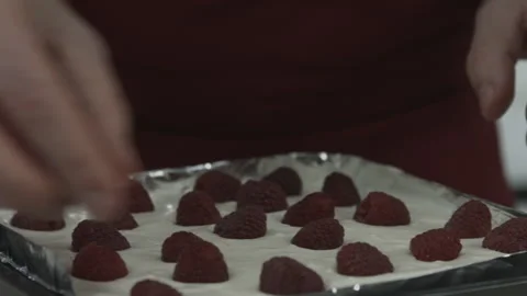 Chef Man Baker Putting Raspberries on Creamy Pie Stock Footage 160963480