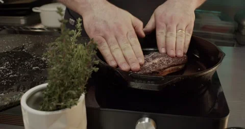 Chef Man Duck Breast Cast Iron Skillet Medium Shot Front 4K 23.98 Stock Footage 149628005