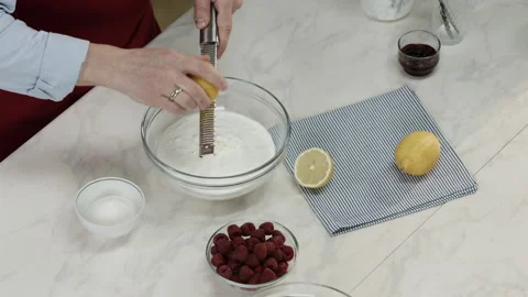 Chef Man Grading Lemon Zest Ingredient in Cream Stock Footage 164020412