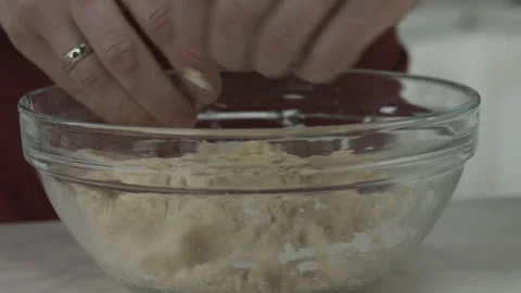 Chef Man Preparing Dough with Hands in Kitchen Stock Footage 160963932