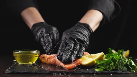 The chef marinates red fish steaks on a ... | Stock Video | Pond5
