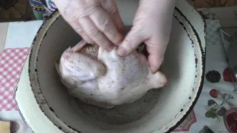 Chef marinating chicken in spices Stock Footage 170935922