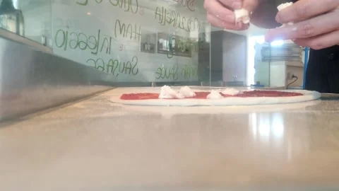 Chef Men Spreads Tomato Paste On Pizza Dough In The Kitchen Table Stock Footage 163867091