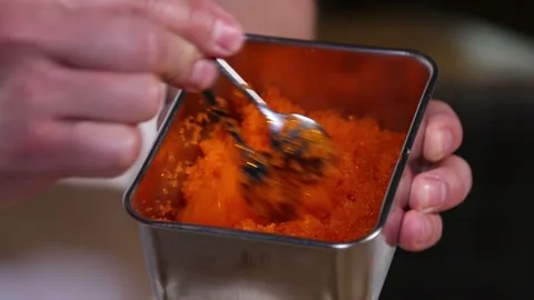 The chef mixes the caviar. Video stock 131005452