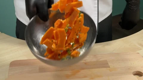 The chef mixes ingredients in a plate Stock Footage 306803271
