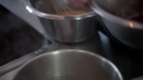 Chef mixing chocolate with egg at kitchen. Stock Footage 64117499