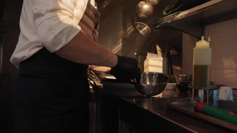 Chef Mixing ingredient in a kitchen of an hotel restaurant Stock Footage 248819385