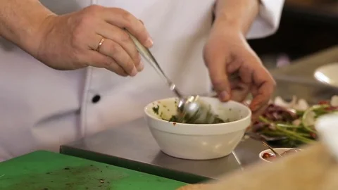 Chef is mixing an ingredient to making some sauce Video stock 74716045