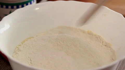 Chef mixing liquid dough with eggs making crepe Stock Footage 36173513
