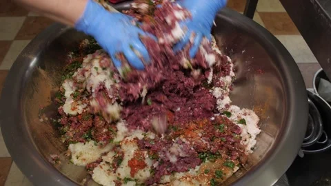 Chef mixing minced meat ingredients for meatballs Stock Footage 331248216