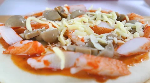 Chef move raw pizza into camera Stock Footage 55810288