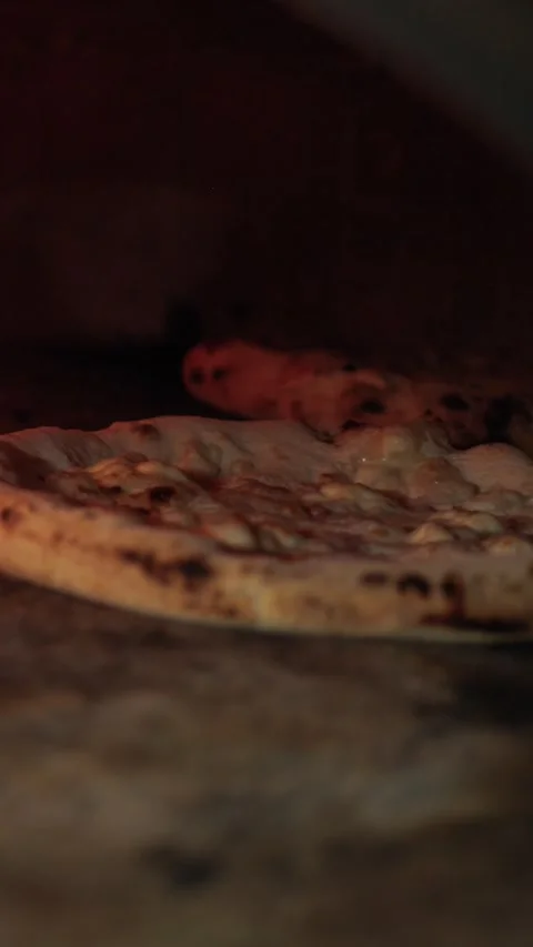 Chef Moving The Pizza Inside The Traditional Oven Stock Footage 288570952