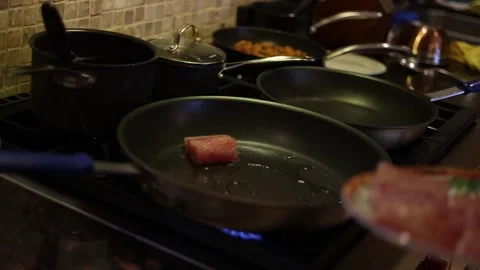 Chef Pan Frying Fish Filets On Kitchen Stovetop. Stock Footage 278021946