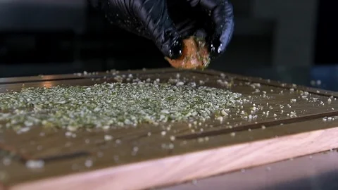 The chef is panning the fish Stock Footage 97881089