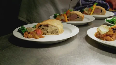 Chef at the Pass Preparing Plates of Food Time Lapse Stock Footage 245970314
