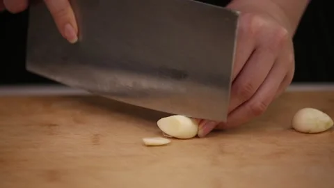 The chef patted garlic and chopped garlic (1) Stock Footage 202166245