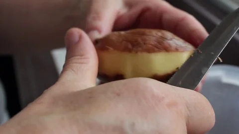 Chef peel potatoes Stock Footage 77695065