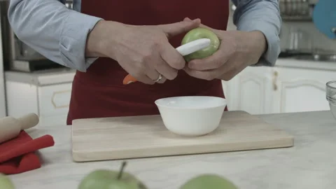 Chef Peeling Apple with Knife Kitchen Equipment Stock Footage 160977520