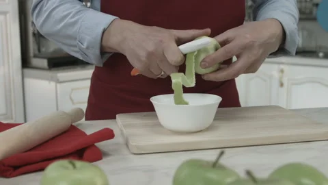 Chef Peeling Apple with Peeler Kitchen Equipment Stock Footage 160963757