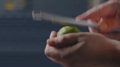 Chef peeling fresh ripe lime with grater while preparing tasty food in kitchen Stock Footage 129683936
