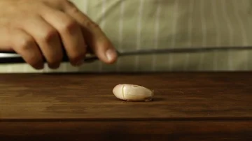 Chef Peeling a Garlic Stock Footage 86135554