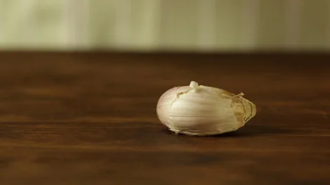 Chef Peeling a Garlic Stock Footage 86136174