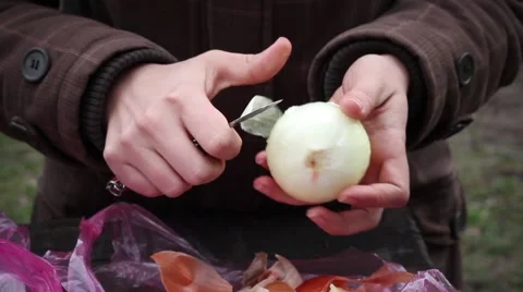 Chef Peeling Onion Stock Footage
