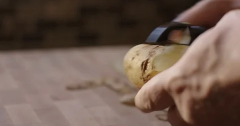Chef Peeling Potatoes 스톡 동영상 105370722