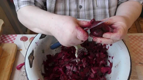 The chef peels the beets Stock Footage 163551474