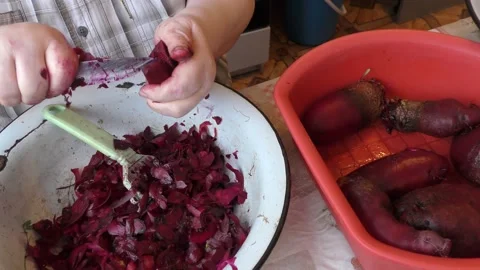The chef peels the beets Stock Footage 163552392
