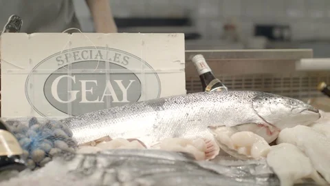 Chef Picking Fresh Salmon From Ice Display At The Seafood Restaurant Next To Video stock 113396737
