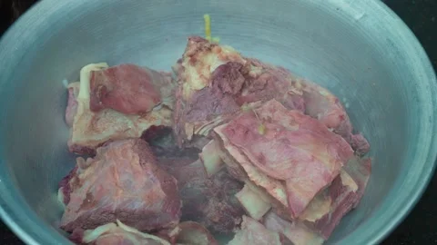 Chef Places Large Pieces of Cooked Meat for Pilaf into Aluminum Bowl Stock Footage 332150802