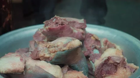 Chef Places Large Pieces of Cooked Meat for Pilaf into Aluminum Bowl Stock Footage 346607641