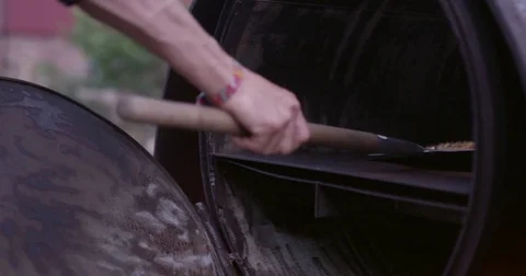 Chef Placing Pizza In Oven Stock Footage 83483593