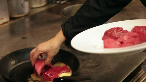 Chef Placing Raw Meat Cubes Sizzling Butter Pan 库存影片 343367802