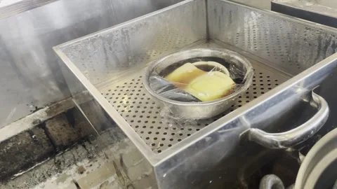 Chef Placing Wrapped Bowl Of Abalone Into Commercial Steamer In Japanese Kitchen Stock-Footage 338307275