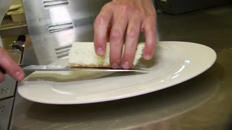 Chef plating dish on table Stock Footage 55308040