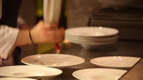 Chef plating food busy Stock Footage 77664031