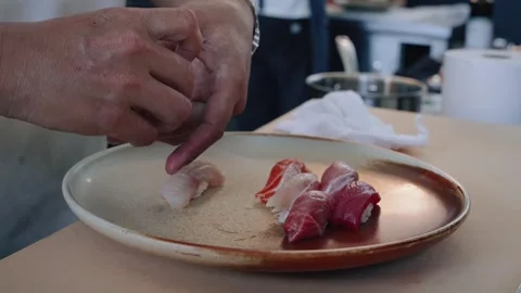 Chef plating nigiri assortment closeup Stock Footage 317456895