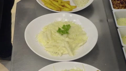 Chef plating pasta at fancy Restaurant 4k Stock Footage 218262967