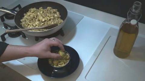 Chef Plating up pasta Video stock 125982687