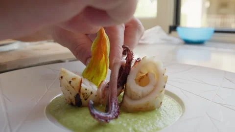 Chef Is Plating A Second Course Of Fish Food On A Green Sauce Base Stock Footage 290385320