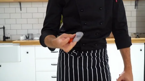 Chef playing with a chef's knife, ib01 Stock Footage 109124262