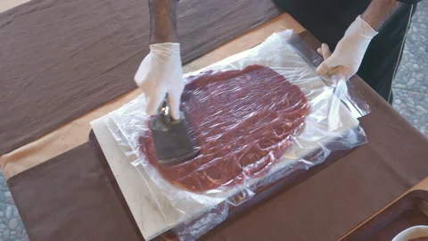A chef pounding meat. Close-up shot Stock Footage 144034211
