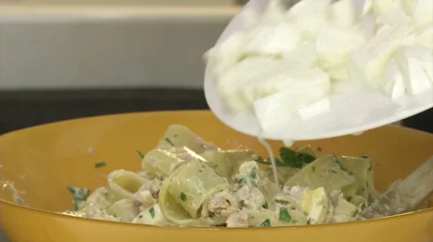 Chef pouring fresh mozzarella cheese in a bowl  Stock Footage 46942206