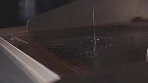 Chef pouring oil on electric stove for cooking meat cutlet for burger Stock Footage