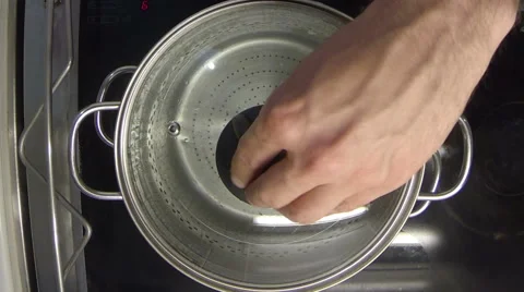 Chef pouring salt in pot full of water  Stock Footage 47967219