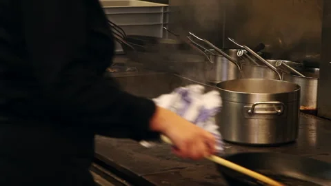 Chef Pouring Sauce Steaming Pot Professional Kitchen Stock-Footage 343397310